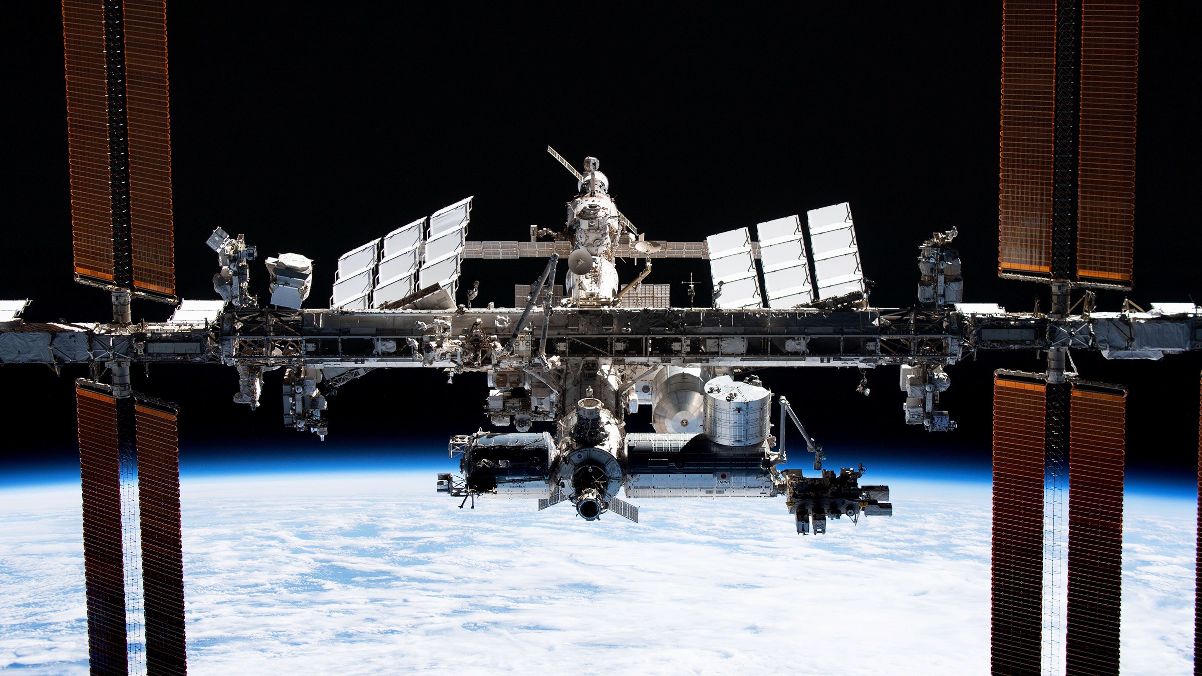 How can microgravity in space help improve drug development?