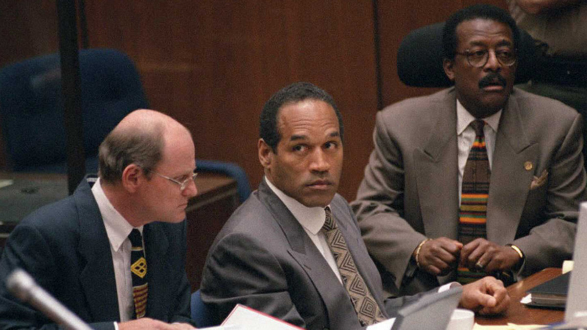 What high-profile event turned OJ Simpson's life from that of a beloved national figure to one of infamy?