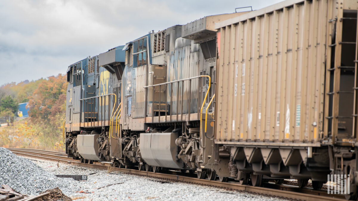 Why did the Transportation Department enact the new federal rule requiring freight railroads to keep two-person crews?