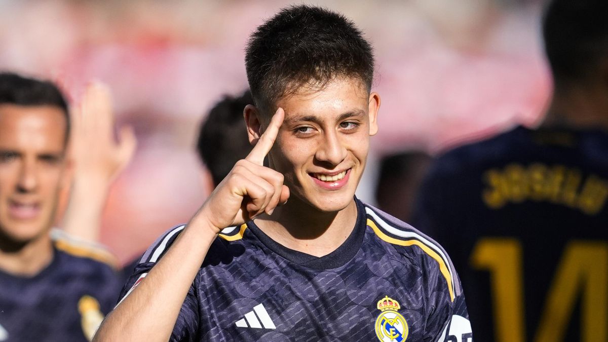 How did Real Madrid perform in their game against Granada and which player scored two goals?