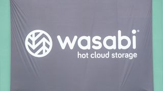 How does Dell natively tier data to Wasabi for complete data protection with long-term cloud retention?
