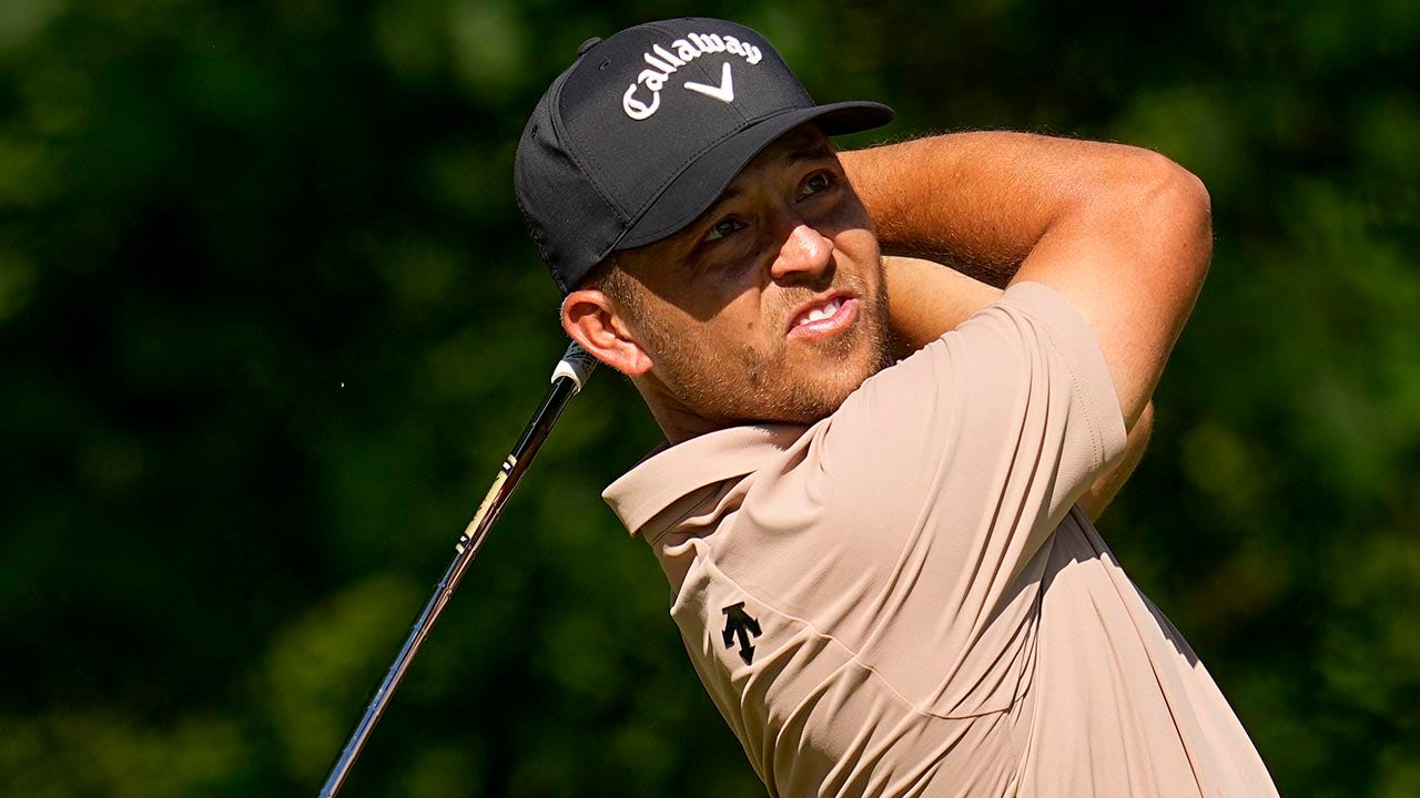 What motivational message did Xander Schauffele's father send him before his big win at the PGA Championship?