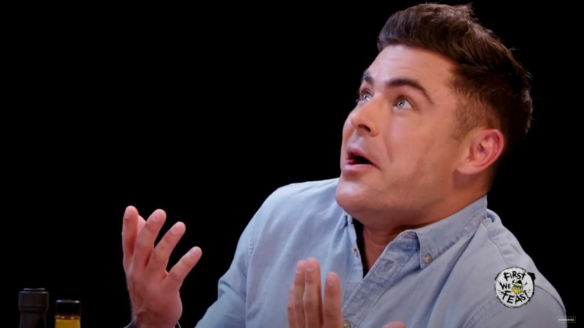 What funny improvs happened during Zac Efron's fake Hot Ones interview for the movie A Family Affair?